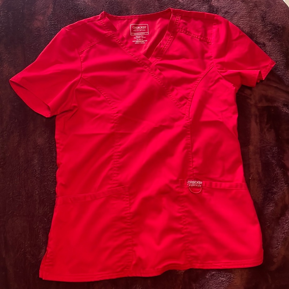 Two Cherokee red scrub tops.
